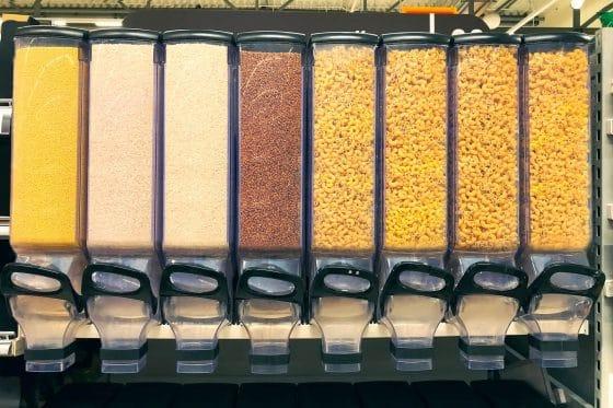 millet, rice, buckwheat, pasta in the containers dispensers